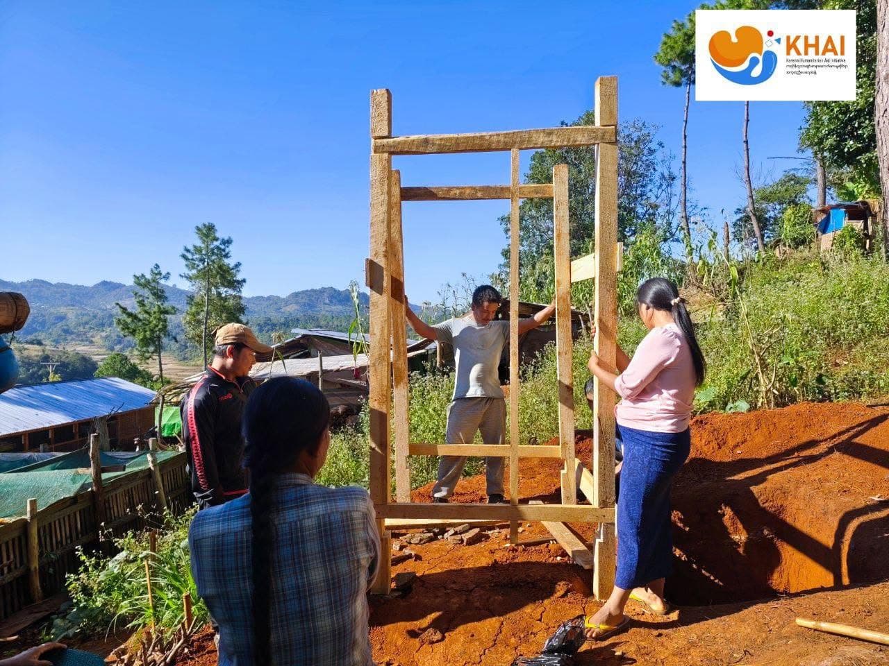 Volunteers building a shelter