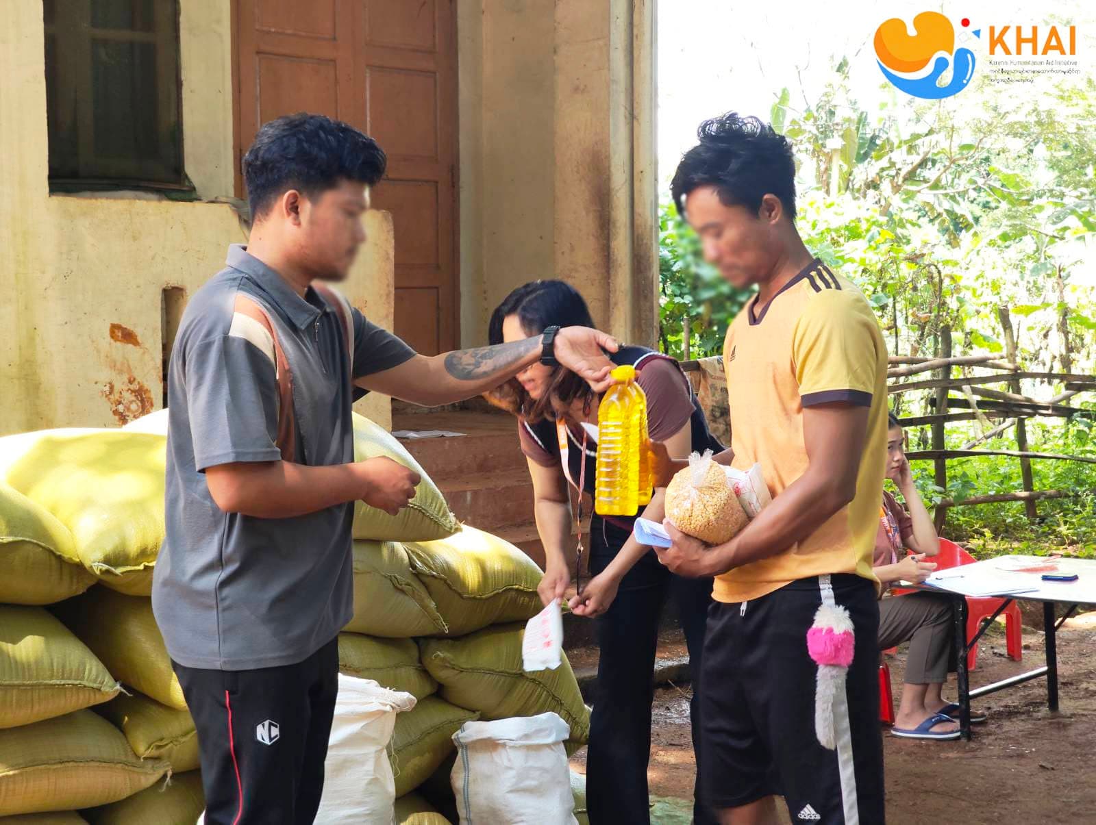 Displaced families receiving shelter kits