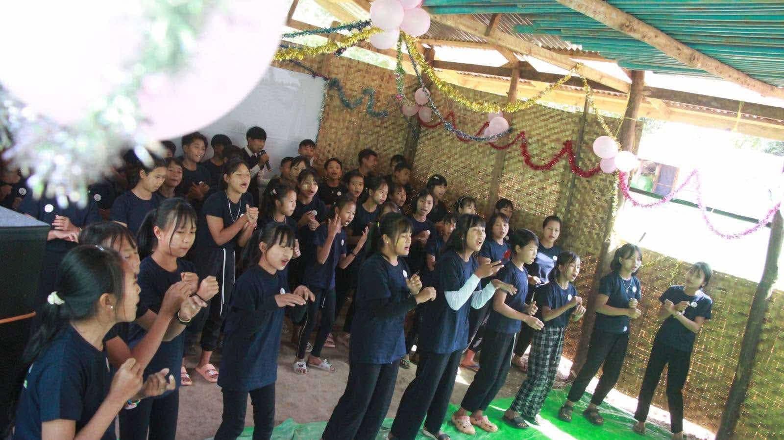 Children attending a temporary learning center