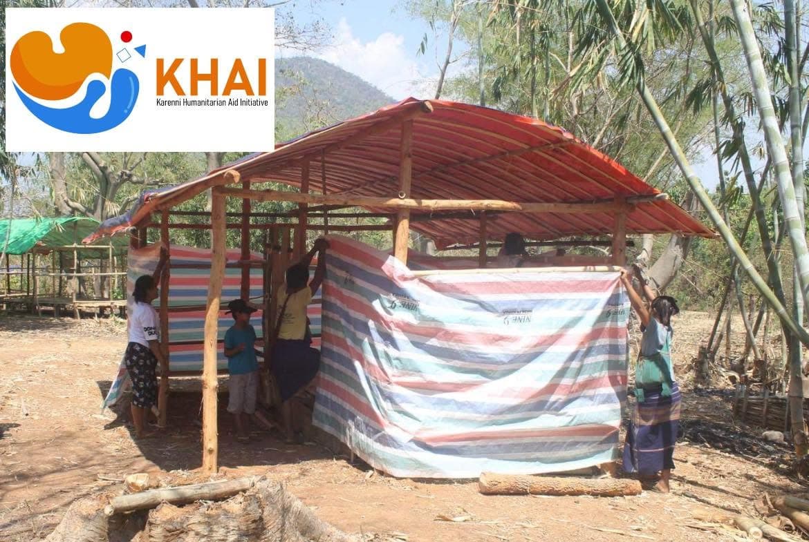 Volunteers constructing emergency shelter units